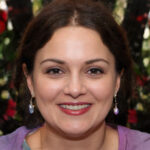 AI-generated profile portrait for Emma Whitmore